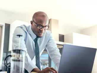 man working at computer