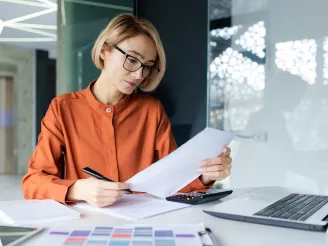 office woman papers glasses