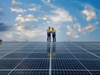 Engineers working on solar panels