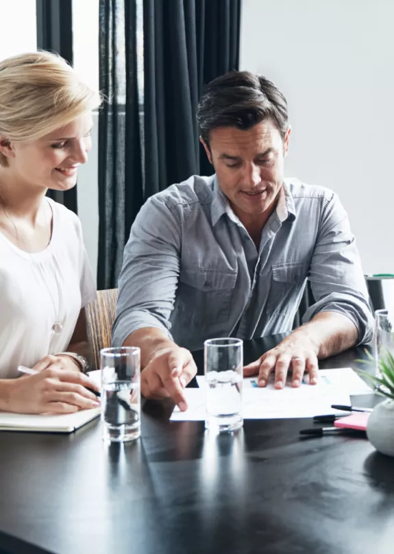 Group of colleagues collaborating in a boardroom